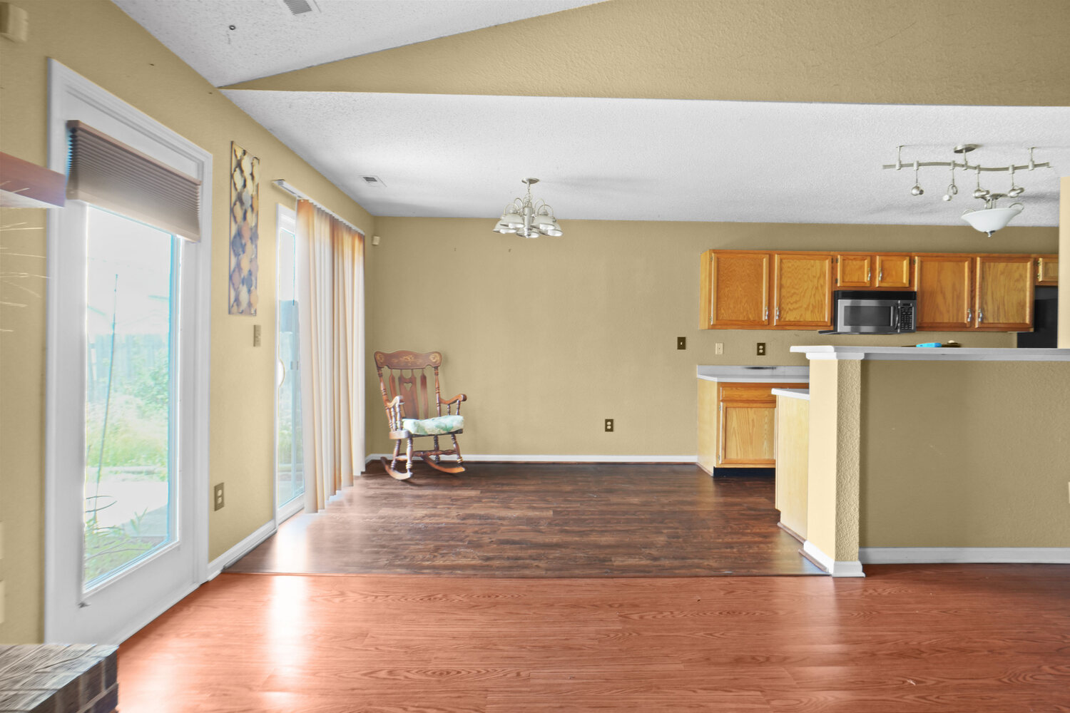 Open great room with vaulted ceiling